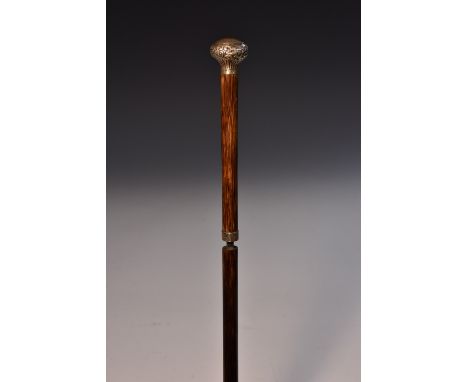 A Victorian sword stick, silver pommel embossed with scrolls and foliage, 92cm long, London 1895