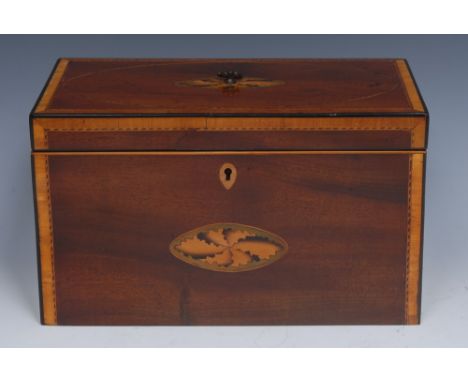 A George III mahogany and satinwood crossbanded rectangular tea caddy,  with barber pole stringing, inlaid with oval paterea,