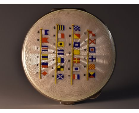 A George V silver and enamel compact, hinged cover decorated in polychrome with naval ensigns, on an opaque engine turned gro