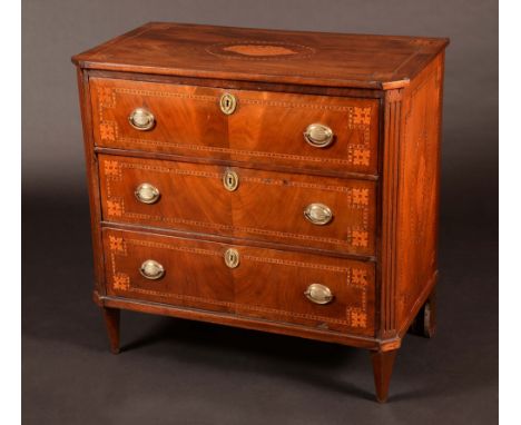 A late 18th century Dutch mahogany and marquetry canted rectangular commode, the slightly oversailing top inlaid with a shell