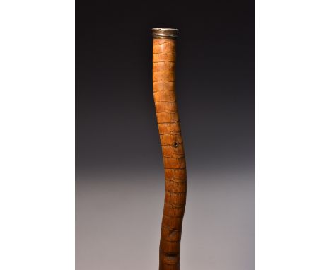 An 18th century silver-mounted rootwood gentleman's walking stick, domed monogrammed pommel, gnarly shaft, 88cm long, c. 1770