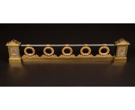 A reproduction Louis XVI style brass fender.