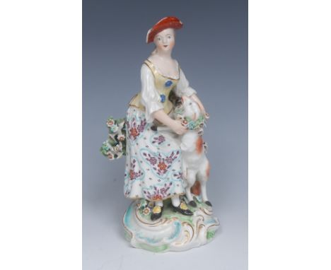 A Derby Patch Mark figure, Garland Shepherdess, she standing wearing a yellow bodice and floral dress, with a sheep wearing a