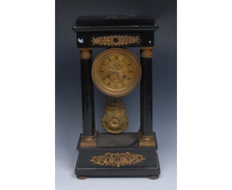 An early 19th century French gilt-metal mounted Belge noir portico clock, 10cm dial inscribed with Roman numerals and chased 