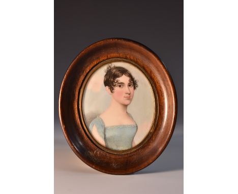 **Smittison,  a 19th century portrait miniature, Lady Burke, looking to sinister, wearing a blue dress, the verso with lock o