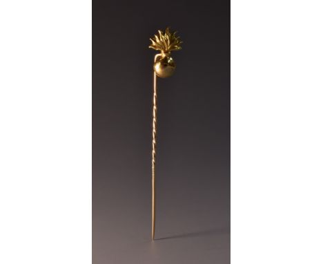 Military Interest - a yellow metal Royal Fusilier's flaming bomb stick pin, spiralled shaft, unmarked, 67mm long, 2g