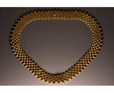 A yellow metal scale link collar necklace, composed of overlapping arching scale panels, invisible compression clasp, unmarke