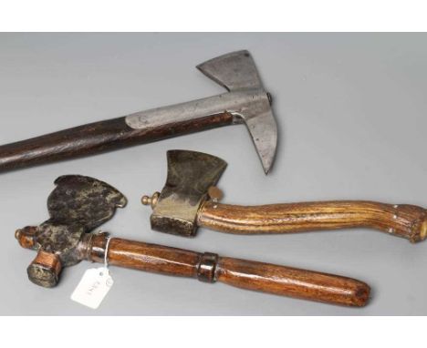 THREE BRITISH AXES, two antique axes, both dug up by the owner and re-shafted, together with a firemans axe, longest 16 3/4" 