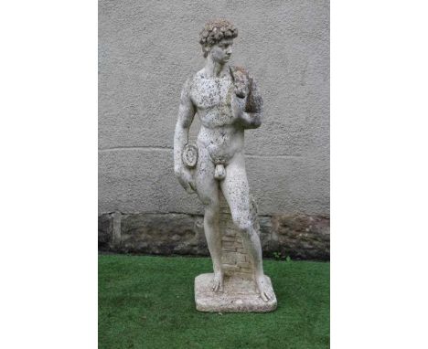 A CAST STONE FIGURE OF DAVID after Michelangelo, on an oblong base, 13" x 47 (Est. plus 24% premium inc. VAT)Condition Report