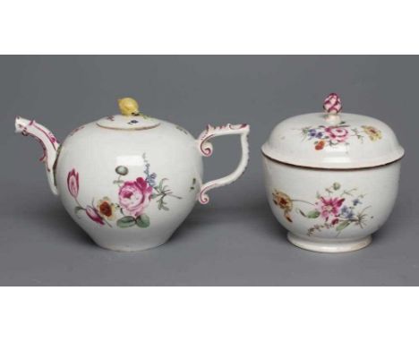 A HOCHST PORCELAIN TEAPOT AND COVER, c.1760, of globular form with scroll handle and mask spout, painted in polychrome enamel