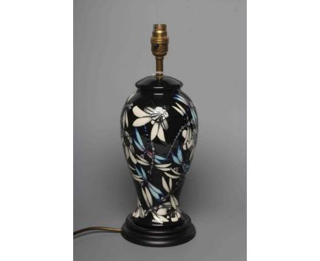 A MOORCROFT POTTERY CLARA PATTERN TABLE LAMP, modern, of inverted baluster form, tubelined and painted in sombre colours desi