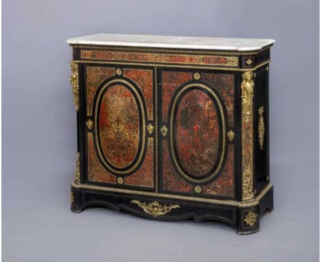 A VICTORIAN RED BOULLE AND EBONISED SIDE CABINET of shallow oblong form with gilt metal mounts, moulded edged earred white ma