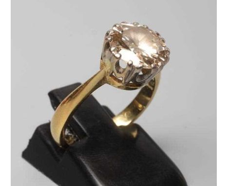 A SOLITAIRE DIAMOND RING, the round brilliant cut stone of approximately 2.35cts, claw set to a plain shank, size K (Est. plu