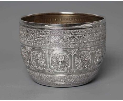 A VICTORIAN INDIANESQUE STYLE SILVER SUGAR BASIN, maker George Fox, London 1871, of plain circular form chased with panels of