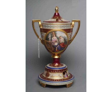 A VIENNA PORCELAIN TWO HANDLED CUP, COVER AND STAND, late 19th century, the rounded conical body with angular gilded handles,