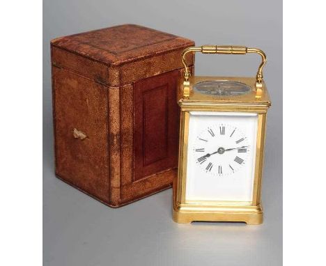 A BRASS CARRIAGE CLOCK, early 20th century, the twin barrel movement with platform escapemant striking the hour and half hour