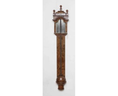 A BURR WALNUT STICK BAROMETER, early 18th century, signed Thomas Wright, Fleet Street, the leaf chased silvered registers wit