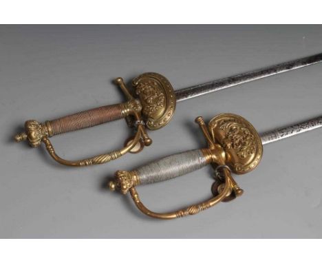 TWO VICTORIAN BRITISH COURT SWORDS, both with brass hilts, shell guards, straight quillon and crown pommel, but one by J Star