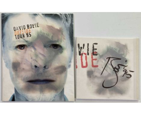 A copy of the 1995 Bowie issued 'Diary of Nathan Adler' signed to front of slip case with date by David Bowie. Also a copy of