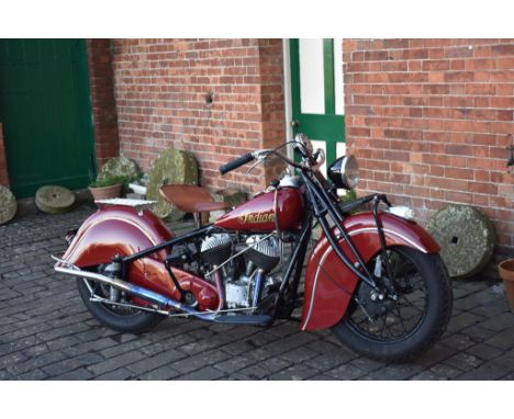 A 1940 Indian Chief, registration number MMK 9, red. Is there a more iconic shape in American motorcycle history than the ful