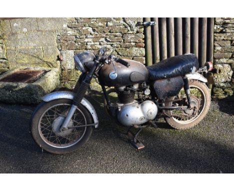 A 1958 AJS Model 14 restoration project, black/chrome.  This AJS is a true barn find having been stored in a Cornish farm bar