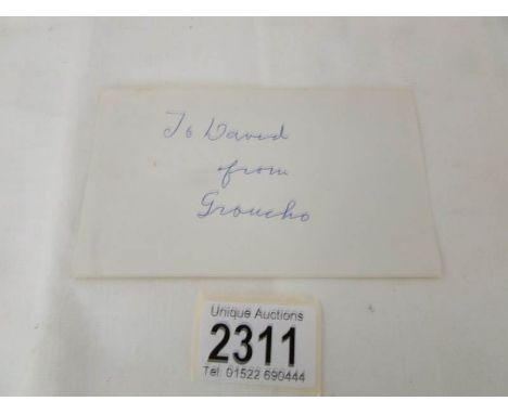 A card autographed 'Groucho' (Marx).