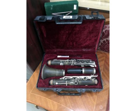 A cased clarinet and an old album