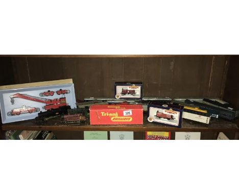A Quantity of 00 gauge model railway rolling stock by Tri-ang, Hornby and Bachmann including steam and diesel locomotives, co