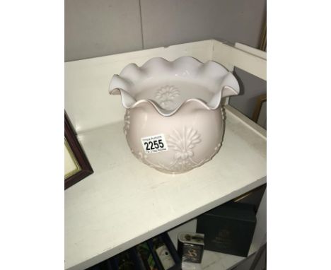 A pink overlaid glass duplex oil lamp shade