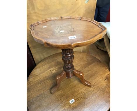 A tripod side table