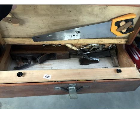 A carpenters chest with tools