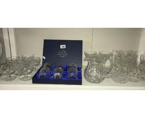 A quantity of boxed crystal and other crystal and glass items