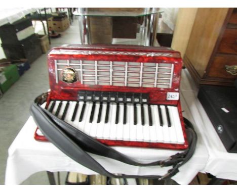 A Royal Standard accordion,.