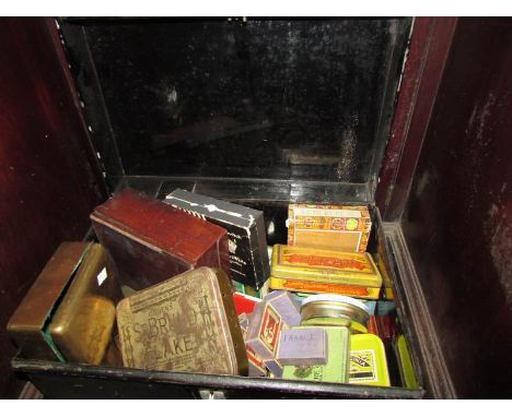 A tin trunk full of vintage cigarette and tobacco tins and boxes including rare examples.