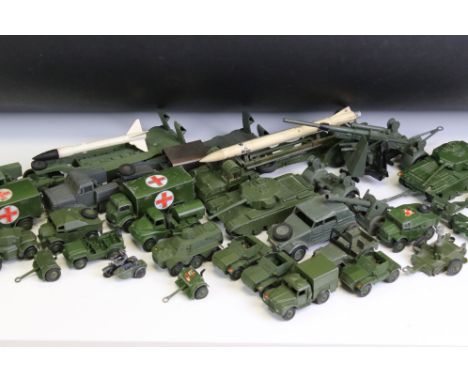 Over 25 Dinky mid 20th C military diecast models to include Supertoys 660 Tank Transporter, 688 Field Artillery Tractor, Trai