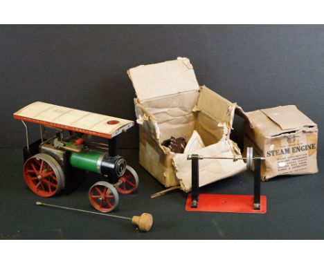 Mamod Steam Tractor TE1A plus a boxed Merit Steam Engine (tatty box) and a group of steam accessories, items showing some wea