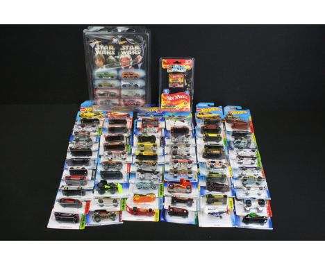 Around 70 carded Mattel Hot Wheels diecast models to include a set of 8 x Star Wars models, ex 