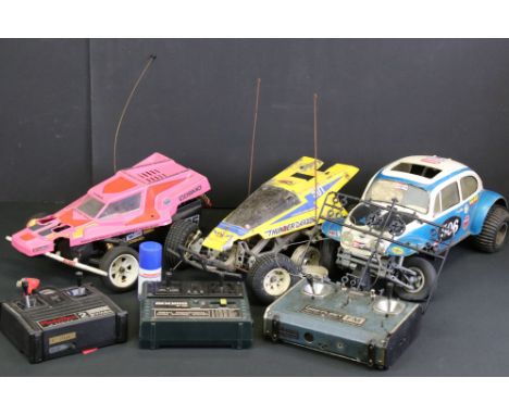 Three 1/10 scale electric R/C remote control cars to include a Kyosho 3084 kit-built Cosmo Off-Road Racer with instructions (