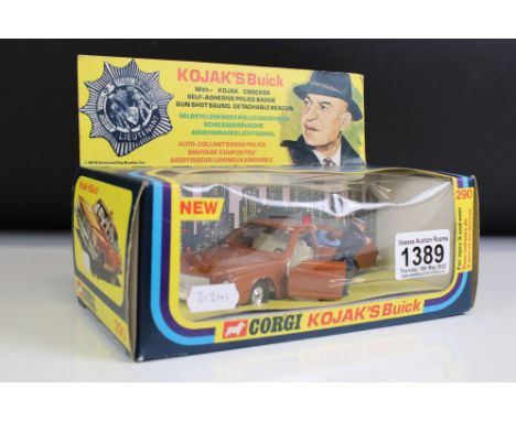 Boxed Corgi 290 Kojak's Buick diecast model complete with figure, diecast ex, box vg with small part of graphic loss to an en