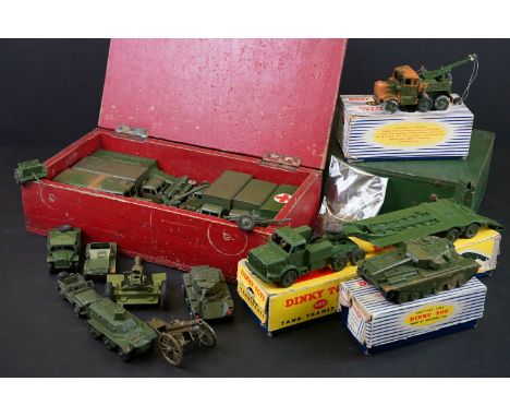 Three boxed Dinky Supertoys diecast military models to include 660 Tank Transporter (yellow box lid), 661 Recovery Tractor an