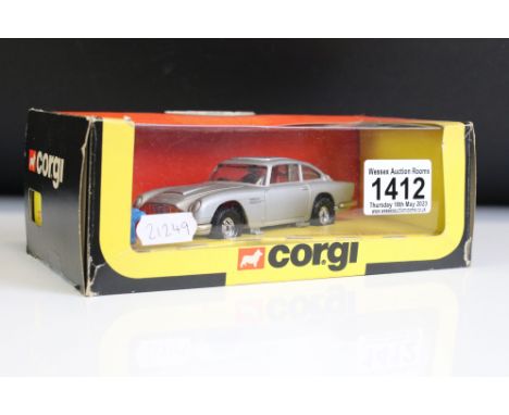 Boxed Corgi 271 James Bond 007 Aston Martin diecast model, diecast excellent with 2 x ejector figures on spruces, box vg with