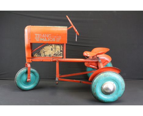 Original metal Triang Major Tractor pedal car in red/orange with blue/turquoise wheels, rusty 