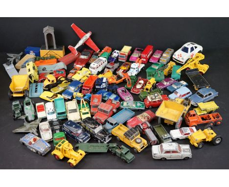 Around 65 mostly mid 20th C play worn diecast models to include Dinky, Corgi, Budgie and Matchbox examples, featuring Corgi S