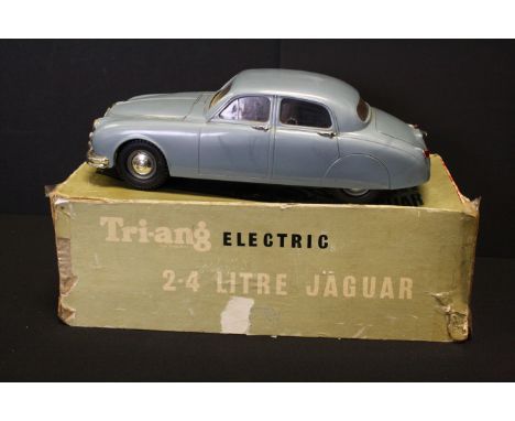 Boxed Triang Battery-operated 2.4 Litre Jaguar, in blue, 1/20 scale (shows play wear; missing steering wheel, dashboard &amp;