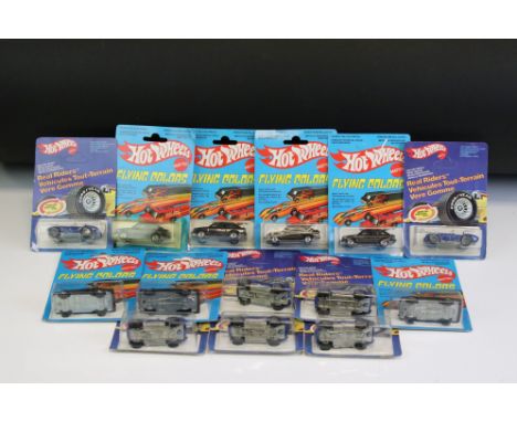 Ex Shop Stock - 14 Carded 1970/80s Mattel Hot Wheels diecast models to include 6 x Flying Colours Ford Escort and 7 x No 4369