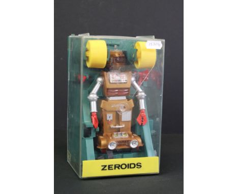 Cased Ideal Toys Zeroids ' Zobor ' motorised plastic robot figure, in orange &amp; metallic grey (showing some surface wear, 