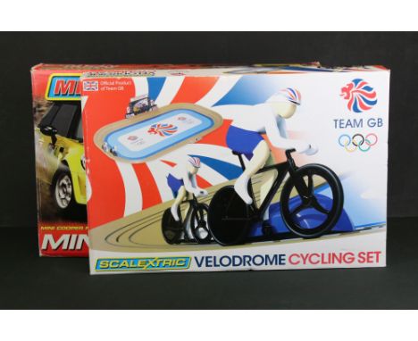 Two boxed Scalextric sets to include Velodrome Cycling Set and Mini Mania, both complete with slot cars 