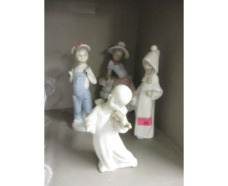 Four Lladro figures to include an oriental angel figure of a young boy playing the violin 