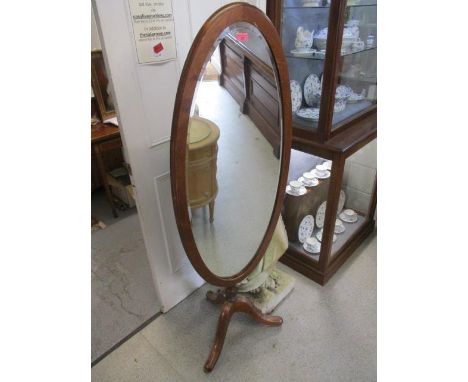 A modern Rosendale pine cheval mirror with a turned column, on a tripod base, 64" h, 20" w 
