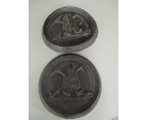 A Victorian pair of cast iron gate post plaques 